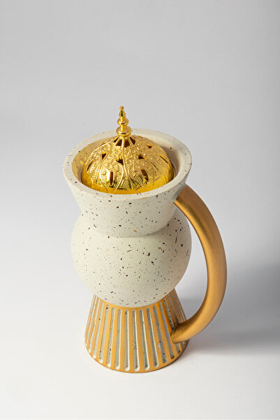 Bin Shihon Poly incense burner in the shape of a beige jug with gold