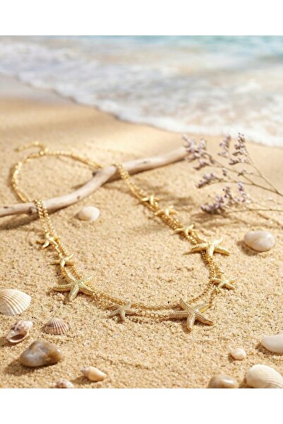 Tasarım حزام خصر معدني ذهبي من زيميرا - إكسسوار عصري متناسق مع الشورتات والسر...