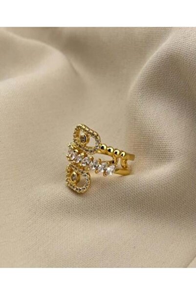 burjalmodah A luxurious gold ring studded with sparkling stones