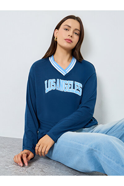 Styli تي شيرت قصة فضفاضة بطبعة جرافيكية باللون الأزرق الداكن