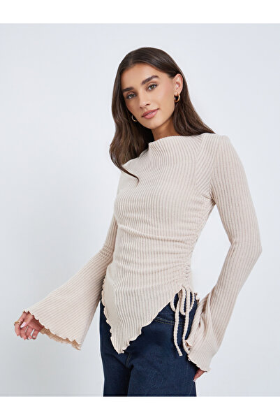 Styli بلوزة بيج مضلعة ذات حاشية غير متماثلة وأكمام طويلة