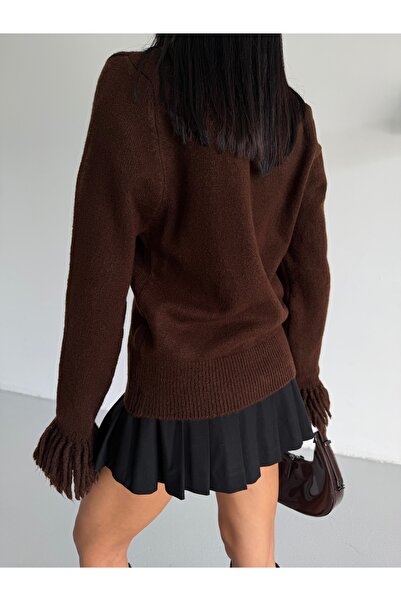 Lamierra Μαλακή γυναικεία ζακέτα με φούντες στα μανίκια