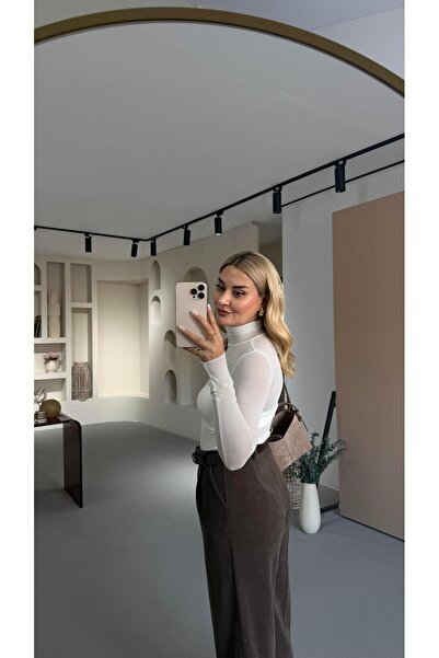 Sezgi Tekin Λευκή διάφανη μπλούζα με ζιβάγκο