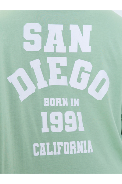 Styli Plus Size Green Oversized Graphic T-Shirt