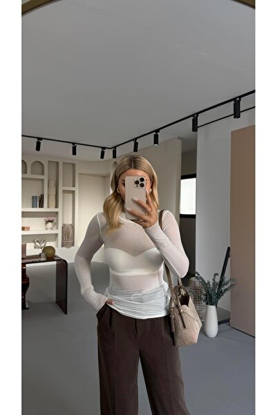 Sezgi Tekin Λευκή διάφανη μπλούζα με ζιβάγκο