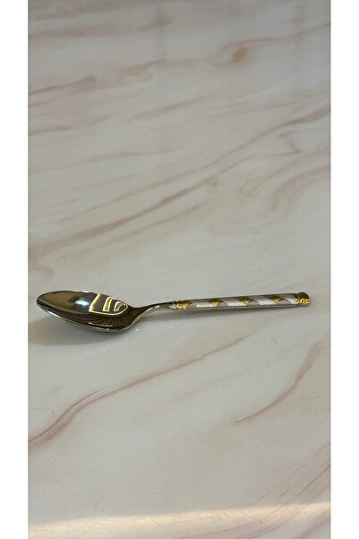 Palaces Silver and gold dinnerware sets including spoons, forks, and knives