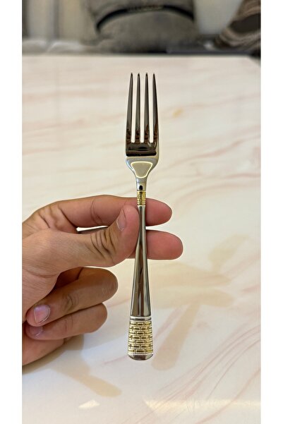 Palaces Silver and gold dinnerware sets including spoons, forks, and knives