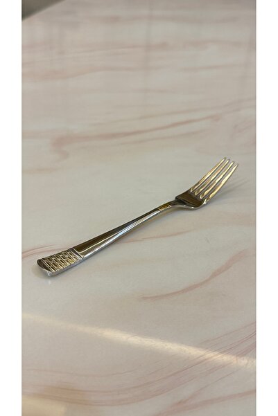 Palaces Silver and gold dinnerware sets including spoons, forks, and knives