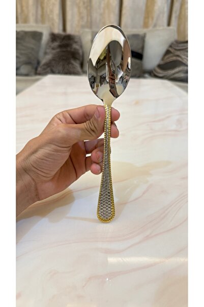 Palaces Silver and gold dinnerware sets including spoons, forks, and knives