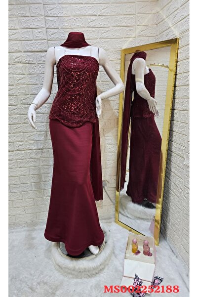 Without You A strapless burgundy red evening dress with a sequined top and a long, fitted skirt.