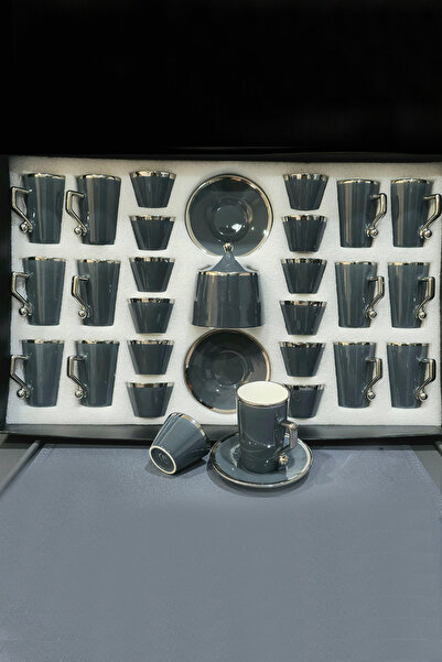 Generic A hospitality set including teacups, coffee cups, saucers and sugar bowl - an elegant design that combines luxury and simplicity.