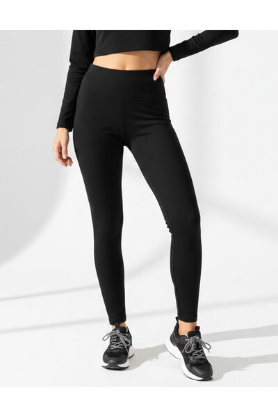 bumerangspor ملابس رياضية نسائية يبرز انحناءات الجسم باللون الأسود