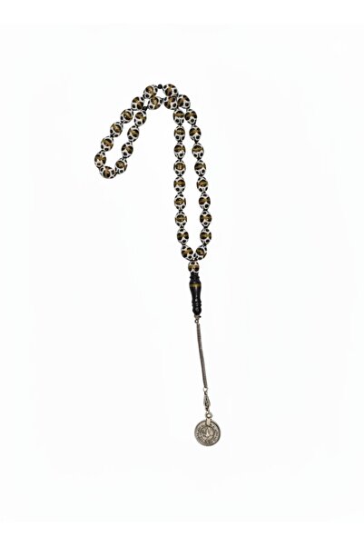 RAM A burnt yusr rosary, inlaid with mother-of-pearl and featuring unique embroidery.