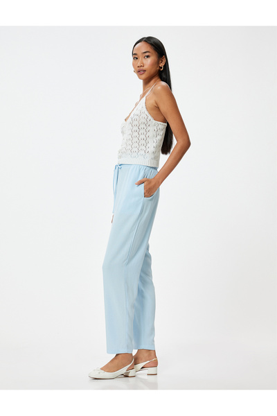 Koton Панталони от ленен микс с шнур в талията и джобове, кройка „морков“