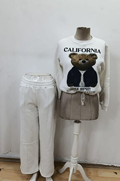 Mossta guler rotund Set din două piese cu bluză și pantaloni cu model - alb