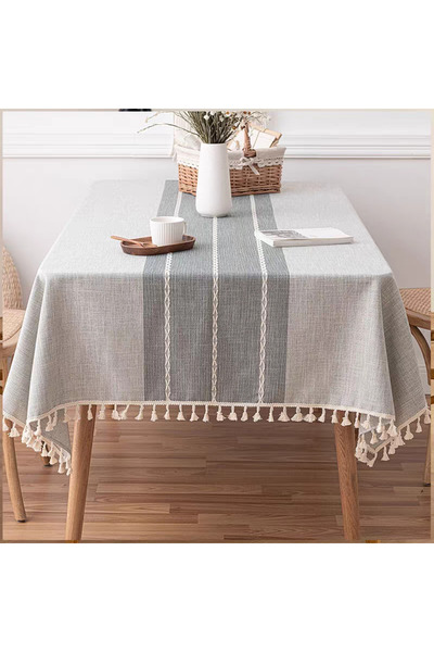 bity thok A luxurious gray linen dining tablecloth with a modern design featuring wicker edges.