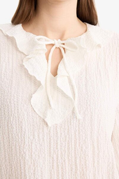 DeFacto Langärmlige Blusentunika mit Schnürkragen und Seersucker-Textur E7968AX25SM