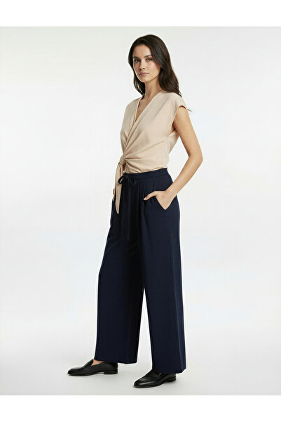 Koton Pantaloni largi din material textil cu buzunare și curea la talie