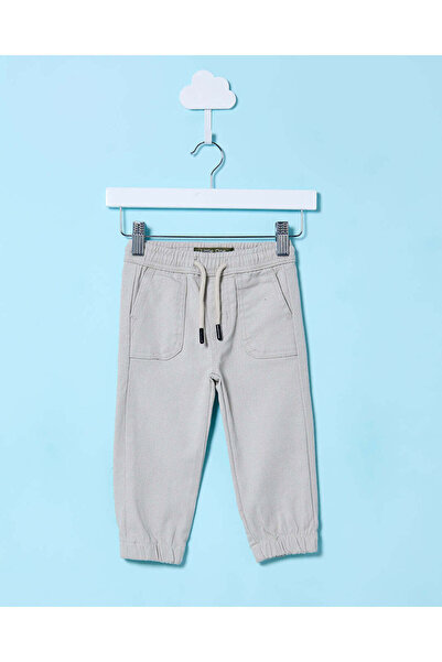 REDTAG بنطال جينز Joggar Denim باللون البيج للأولاد الرضع