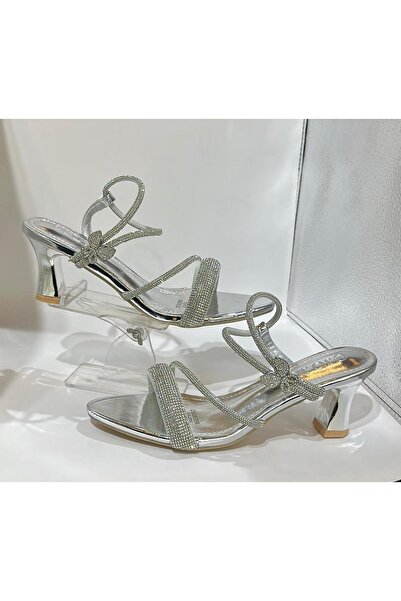 JOJO Women's sandal with a wide stone strap at the front, a stone strap at the side, and a butterfly-shaped bow.