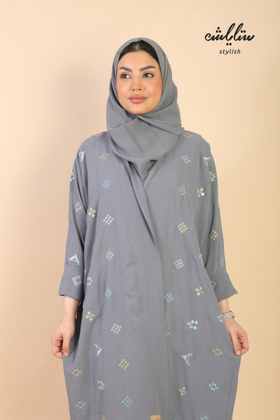 Stylish Crepe wrap abaya in gray with embroidery all over the abaya