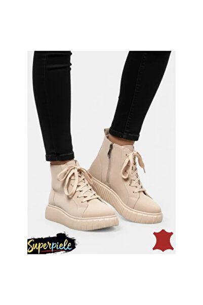 kevali Women's beige casual leather boots with laces and zipper.