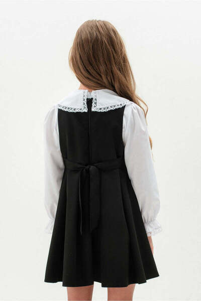 SOLLUXE NIARA – Woolen pinafore with elegant bow and pleated design, black, 128