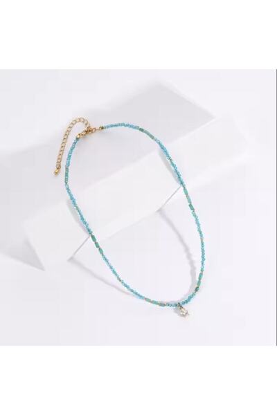 Ezera Colin choker necklace, apatite crystals with zircon star charm, gold-plated copper