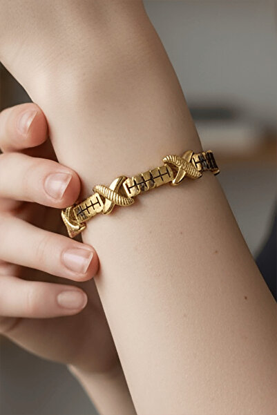 TAKIŞTIR سوار من الفولاذ ذو شكل متقاطع ذهبي اللون