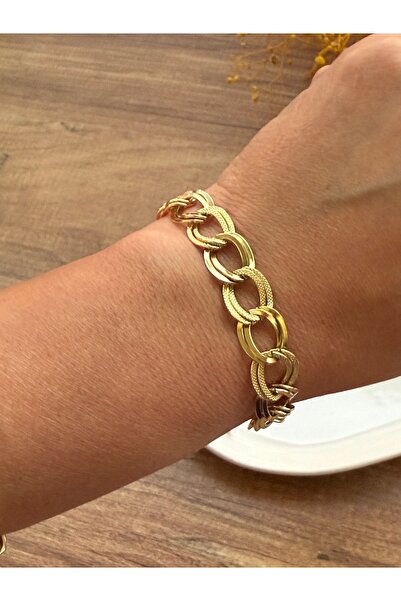 Blotch سوار من الفولاذ الذهبي بتصميم حلقات متداخلة على طراز درب التبانة القديم