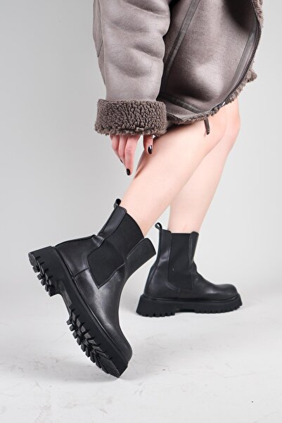 Birikon حذاء جينت المطاطي باللون الأسود