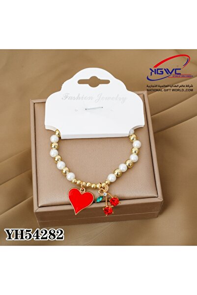 KAZUKO Pearl and gold beaded bracelet with a heart and cherry pendant.