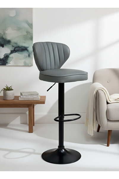 Living كرسي بار دوار بمقعد ومسند ظهر من الجلد، يتميز بتصميم مثلث مقلوب منحني