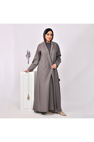 HAWRAA ABAYA A practical gray wrap abaya with detailed stitching.