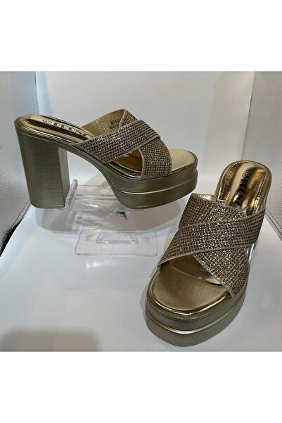 Bronz Women's sandals with a wide X-shaped heel and studded front.