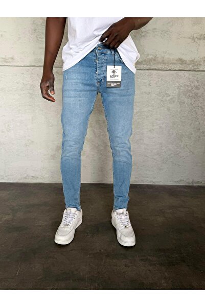 KağanKY جينز سليم فيت بتفاصيل ليزر باللون الأزرق الفاتح