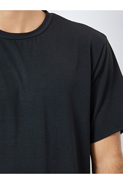 Styli Men Relaxed Fit Solid T-Shirt and Checked Pyjama Set