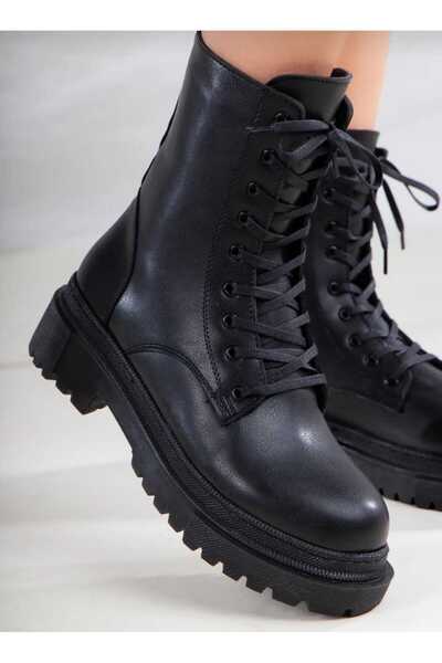 MCN MODA siyah cilt bacğklı kısa bot