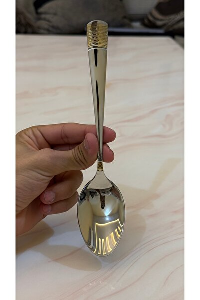 Palaces Silver and gold dinnerware sets including spoons, forks, and knives