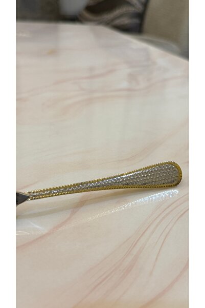 Palaces Silver and gold dinnerware sets including spoons, forks, and knives