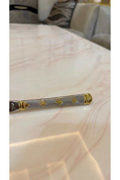 Palaces Silver and gold dinnerware sets including spoons, forks, and knives