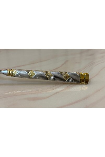 Palaces Silver and gold dinnerware sets including spoons, forks, and knives