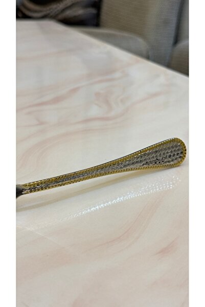 Palaces Silver and gold dinnerware sets including spoons, forks, and knives