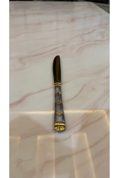 Palaces Silver and gold dinnerware sets including spoons, forks, and knives