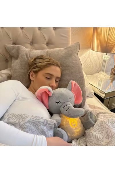 elefant плюш , който имитира дишане и свети