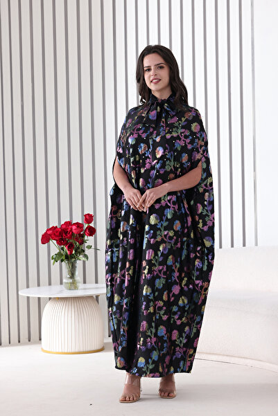 Verona Trading Company A luxurious black jalabiya with a colorful floral pattern and a wide cape-style front tie.