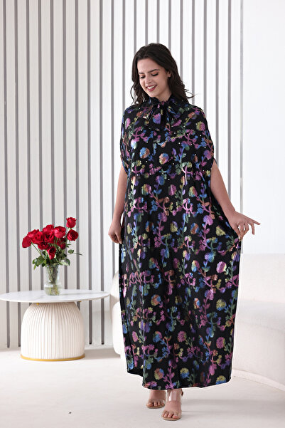 Verona Trading Company A luxurious black jalabiya with a colorful floral pattern and a wide cape-style front tie.