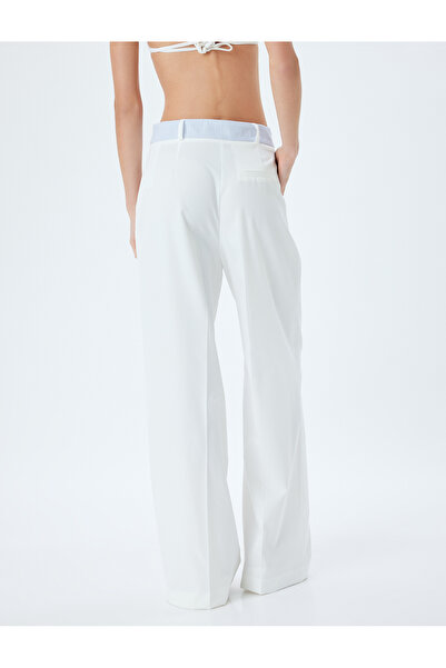 Koton Wide Leg Fabric Pants with Asymmetrical Zipper Detail and Pockets