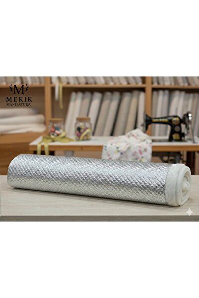 MEKİK MANİFATURA Срібна ламе капітоне тканина