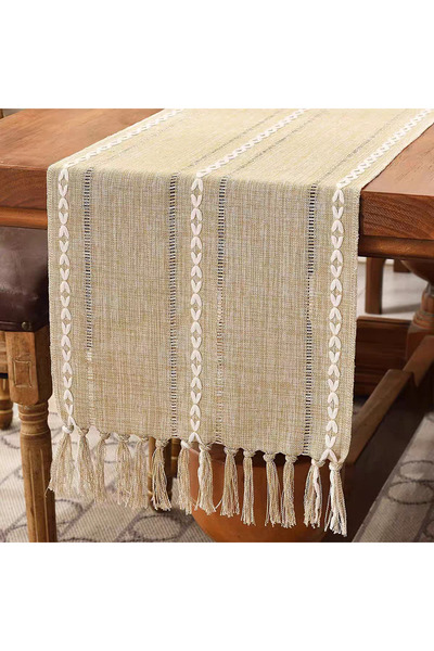bity thok A luxurious beige tablecloth with a modern design and interlocking strand edges.